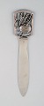 Danish silver, large letter opener, a ball of yarn.
silver (.830), 1940s.
