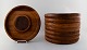 Jens H. Quistgaard: A set of eight solid teak dishes. 
