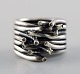 Swedish modernist sterling silver ring with 14 brilliants.