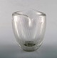 Tapio Wirkkala for Iittala. Finland, app. 1960.
Clear glass vase with engraved decoration in the form of stripes.