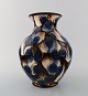 Kähler, Denmark, glazed stoneware vase in modern design.
1930 / 40s. Cow horn technique.