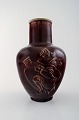 Royal Copenhagen Jais Nielsen ceramic vase in ox blood glaze.
