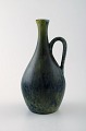 Carl Harry Stålhane, Rörstrand bottle vase with handle in stoneware.