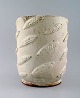 Christian Poulsen: Cylindrical unique vase of stoneware modeled with bellows. 
Decorated with light gray glaze.