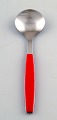 Bouillon spoon. Henning Koppel. Strata cutlery stainless steel and red plastic.
