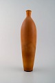 Large Berndt Friberg Studio art pottery vase. Modern Swedish, mid 20 c. Unique, 
handmade. Amazing glaze in shades of golden brown!
