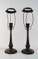 Just Andersen. A pair of table lamps in patinated "disko" metal.
