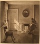 Peter Ilsted (1861-1933). Interiør med læsende kvinde. Mezzotinte.