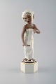 Arno Malinowski for Royal Copenhagen, number 12238. Bali girl. Very rare 
porcelain figurine in overglaze.
