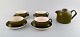 Timiana dinner service from Aluminia in faience. Consisting of 4 tea cups with 
saucers and tea pot. 1960.

