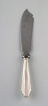 Danish silversmith. Art deco layer cake knife in silver (830). Dated 1950.
