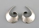 A pair of Scandinavian modernist earrings in hammered sterling silver. 1960