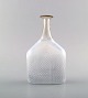 Bertel Vallien for Kosta Boda, Sweden. Vase / bottle in light blue mouth blown 
art glass. Swedish design 1980