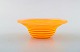 Gunnel Sahlin for Kosta Boda Atellier, Sweden. Yellow bowl in art glass 
decorated with orange spiral. 1994.