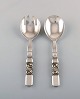 Georg Jensen. Cutlery, Scroll No. 22, hammered sterling silver salad set in full 
silver.