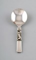 Georg Jensen. Cutlery, Scroll no. 22, hammered Sterling Silver. Sugar spoon.
