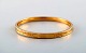 Vintage MARATHON Co. classic bracelet in 14 carat gold, chiselled with flowers. 
1970