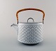 Bing & Grondahl. Tea pot with handle in wicker work.
