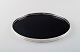 Fisher Silversmiths (Co.) serving tray in sterling silver and ebonite.
Stylish design, 1960