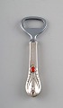 Evald Nielsen number 3. Bottle opener in hammered silver with cabochon coral 
bead. 1920