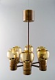 Hans Agne Jakobsson (1919-2009) Six-armed electric chandelier in brass with 
screens in mouth blown art glass.