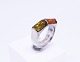 Ring of 925 sterling silver decorated with amber.
5000m2 showroom.