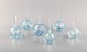 Edward Hald for Orrefors. A collection of six mouth blown art deco flacons in 
light blue art glass. Designed in the 1940