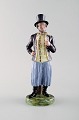 Antique and rare Bing & Grondahl, B&G figure in national costume. High quality 
overglaze. 1870