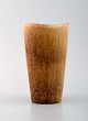 Rørstrand / Rorstrand stoneware vase by Gunnar Nylund.
Beautiful glaze in bright earth shades. 1960