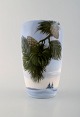 Royal Copenhagen. Vase with winter motif and pine cones. 1920