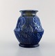 Møller & Bøgely, Denmark. Art nouveau ceramic vase in dark blue glazed ceramics. 
Ca. 1920.
