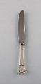 S. Chr. Fogh, 1912-1973. Danish silversmith. "Beaded" lunch knife in hammered 
sterling silver. 1950