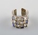 Swedish modernist ring in sterling silver with semi precious stones. 1960