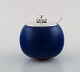 Saxbo / Hans Hansen. Jam jam in glazed ceramics with lid and spoon in silver. 
Beautiful glaze in deep blue shades. 1940 / 50