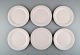 Jens H. Quistgaard for Bing & Grondahl. Six white "Cordial Palet" lunch plates 
in glazed stoneware. 1960
