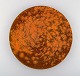 Svend Hammershøi for Kähler, Denamrk. Dish in glazed stoneware. Beautiful orange 
uranium glaze. 1930 / 40