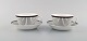 Stig Lindberg for Gustavsberg. A pair of "Spisa Ribb" teacups with saucers. 1950 
/ 60