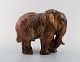 Knud Kyhn for Royal Copenhagen. Large elephant in glazed stoneware. Beautiful 
sung glaze in reddish brown shades. 1940/50