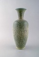 Gunnar Nylund for Rörstrand. Large vase in glazed ceramics. Beautiful eggshell 
glaze in blue-green shades. 1950