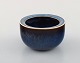 Carl-Harry Stålhane for Rörstrand. Bowl in glazed stoneware. Beautiful glaze in 
blue and brown shades. 1960