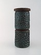 Finnish ceramist. Large vase in glazed ceramics. Beautiful glaze in black and 
turquoise shades. Dated 1968.