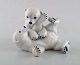 Allan Therkelsen for Royal Copenhagen. Rare porcelain figurine model 324. 
Playful polar bear cubs.