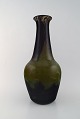 Daum Nancy, Frankrig. Kolossal art deco vase i mundblæst kunstglas i grønne og 
brune nuancer. 1930/40