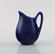Hertha Bengtson for Rörstrand. "Blå eld" porcelain creamer. Beautiful deep blue 
glaze. 1960