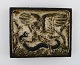 Knud Kyhn for Royal Copenhagen. Wall plaque in glazed stoneware with eagle and 
snake in relief. Beautiful sung glaze. Model Number: 21719. 1940 / 50