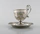 Gebrüder Friedländer, Berlin. Antique coffee cup with saucer in silver (800) 
with classicist motifs. 19th century.
