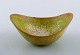Gunnar Nylund for Rörstrand. Bowl in glazed ceramics. Beautiful lime green 
eggshell glaze. Mid 20th century. 
