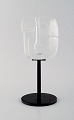 Mats Jonasson for Måleras. "Masq" sculpture of face in art glass with stand in 
iron. Swedish design, 1970s.
