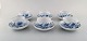 Six antique Meissen "Blue Onion" teacups with saucer in hand-painted porcelain. 
Early 20th century.
