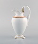 Antik Meissen empire porcelain cream jug with gold decoration. Ca 1830.
